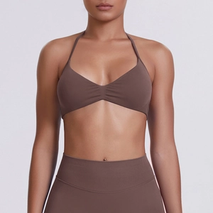 Brown halter neck seamless sports bra and high-waist yoga set for fitness and gym workouts