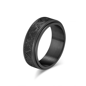Black stainless steel spinner ring with Eye of Horus engravings and brushed finish