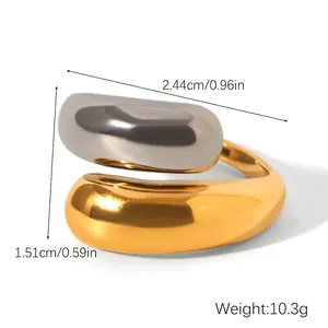 Detailed view of bicolor thick wrap ring in gold and silver with size and weight metrics