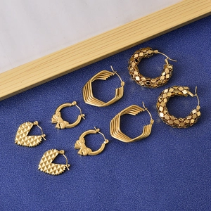 Chic gold hoop earrings set with rhombic patterns, bow details, and textured metal designs