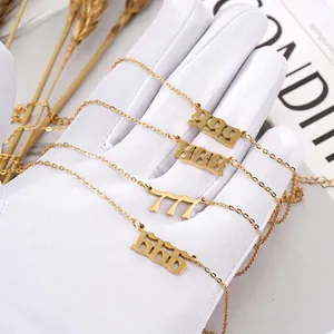 Golden stainless steel angel number necklace featuring gothic pendant and O-chain style