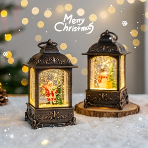 Vintage Christmas snow globe lantern with warm LED lights and music box for holiday decor.