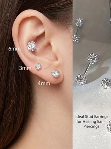 Gros plan de boucles d'oreilles sphériques avec zircons cubiques en tailles 3mm, 4mm et 6mm