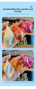 Detailed view of colorful iridescent acrylic conch keychains with secure metal clasps