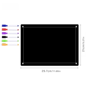Macro view of A4 black magnetic acrylic weekly planner with six colorful markers