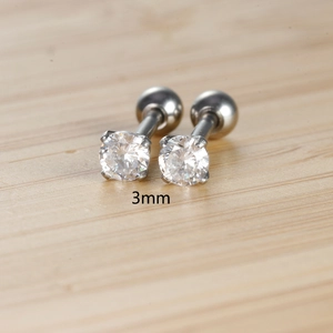 Macro shot of 3mm four-claw cubic zirconia stud earrings with screw ball backs