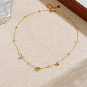Exquisite gold-plated ball chain necklace featuring zircon-encrusted heart pendants
