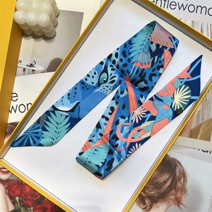 Blue and orange silk scarf with tropical toucan print in a yellow gift box