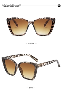 Detail view of tortoiseshell oversized cat-eye sunglasses with gradient brown lenses