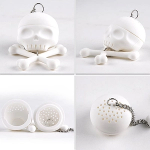 Detail view of white silicone skull tea infuser showing front side and interior structure
