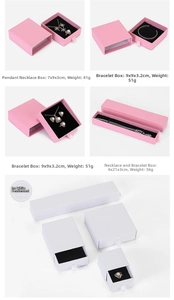 Various sizes of pearlescent drawer jewelry boxes for necklaces, bracelets, and rings