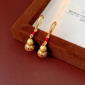 Brushed gold gourd drop earrings with red enamel detail in a vintage Chinese style