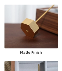 Detail of hexagonal golden metal base and support rod for jewelry display stand