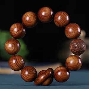 Macro de perles en bois de rose avec gravure Zhaocai Jinbao et détail d'abaque