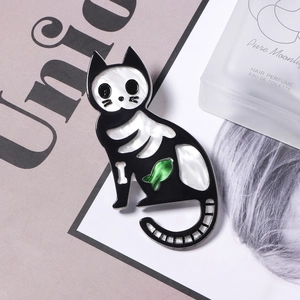 Acrylic Halloween cat brooch with skeleton details and small green fish design
