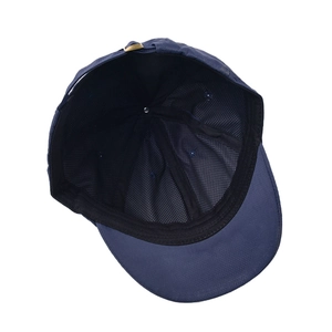 Detailed view of navy baseball cap featuring breathable black mesh lining and metal buckle