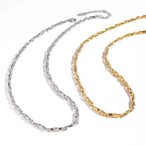 Minimalist geometric link chain necklace in gold and silver finish with twisted metal texture
