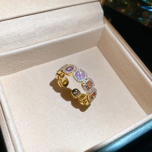 Close-up of 14k gold plated ring with colorful zircon stones and micro-pave crystals