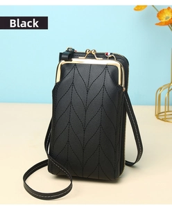 Close-up of black vertical crossbody phone bag with V-quilted faux leather and gold clasp