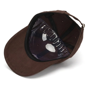 Detail view of cotton baseball cap interior featuring black sweatband and metal buckle