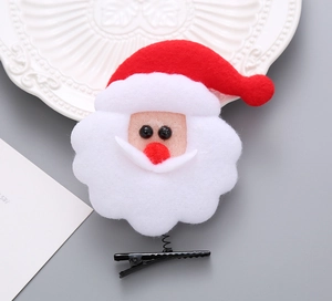 Detalle de la horquilla de Papá Noel en fieltro con resorte y base de metal negro