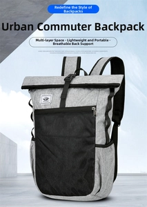 Detailed view of the roll-top closure and front mesh pocket on this light gray backpack
