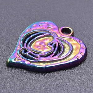 Macro shot of iridescent heart pendant accessory with rainbow metallic finish for DIY jewelry