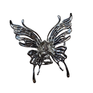 Silver liquid metal irregular butterfly hair claw clip with a glossy minimalist finish