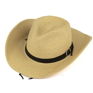 Close-up of western straw cowboy hat featuring breathable texture and black chin strap