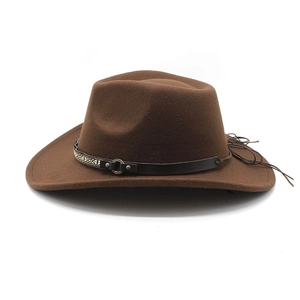 Close-up of brown wool felt cowboy hat with leather band and metal buckle detail