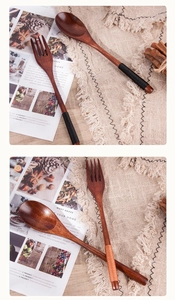 Detailed view of dark wood spoon and fork set with braided handles on linen