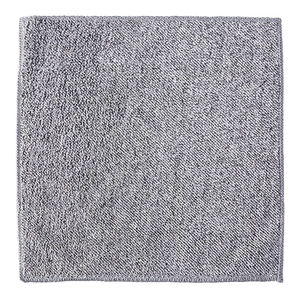 Thick charcoal fiber cleaning cloth showing gray square microfiber texture for kitchen use