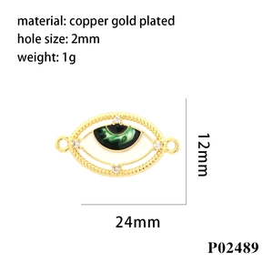 Detailed view of evil eye connector with gold plating, green enamel, and dimensions