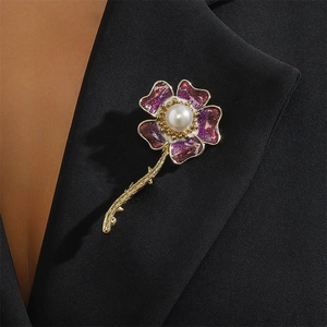 Pastel purple enamel daisy brooch with pearl center on black blazer lapel pin