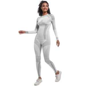 Detail of grey seamless thermal base layer set showing breathable geometric weave patterns