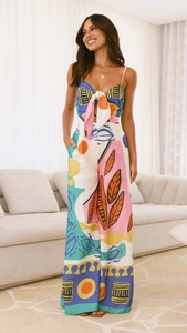 Close-up of abstract artistic graffiti print on flowy fabric for two-piece women's set