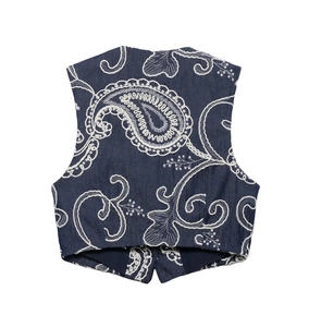 Detailed view of white paisley embroidery on navy blue sleeveless crop vest top