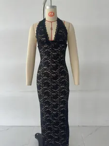 Close-up of black lace bodycon dress featuring halter neckline and backless detail