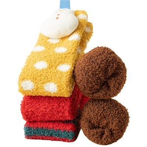 Plush coral fleece Christmas socks with cute cartoon figures and warm thickened texture