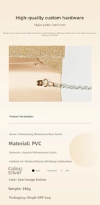 Detail of metal chain connection and sparkling rhinestone bow on evening clutch bag