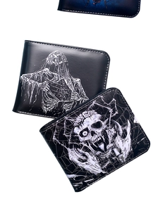Detailed view of three black PU leather wallets with white skull, grim reaper and spider prints