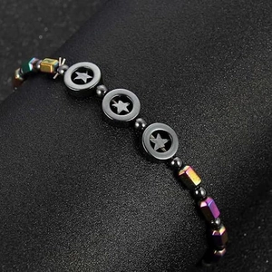 Star charm hematite bracelet with iridescent cubic magnetic beads on black background