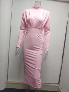 Detail of pink long sleeve bodycon dress showing waist pleats and turtleneck design