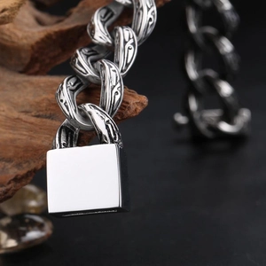 Vintage stainless steel cross bracelet for men with heavy curb chain and polished padlock
