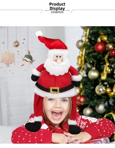 Toddler wearing a plush Santa Claus hat with beard and boots in Christmas setting