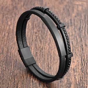 Men's double-layer braided black leather bracelet with steel bead chain on wood surface