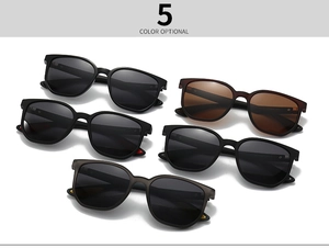 Flat lay of polarized sunglasses in five colors including classic black and deep brown