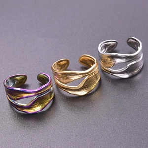 Modern minimalist snake-style wavy stainless steel open rings in gold, silver, and iridescent