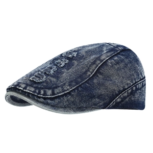 Vintage dark blue washed denim ivy cap with distressed letter embroidery and retro style