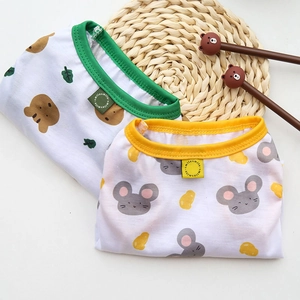 Breathable cotton dog vests featuring cute bear and mouse patterns on woven grass mat